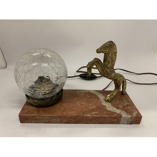 83 - AN ART DECO MARBLE LAMP WITH BRASS HORSE DESIGN, LENGTH 23CM