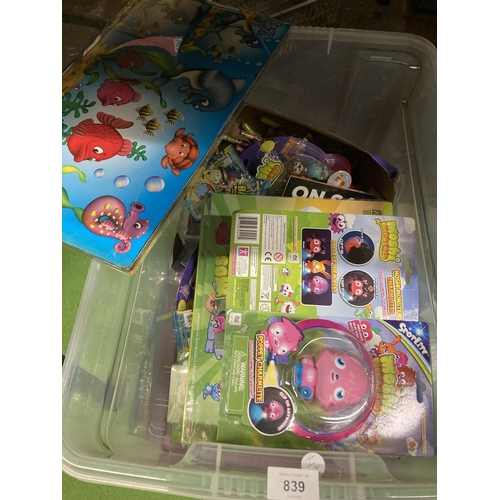 839 - A LARGE QUANTITY OF NEW ITEMS TO INCLUDE MOSHI MONSTERS REWARD CHARTS, FIGURES, TRADING CARS