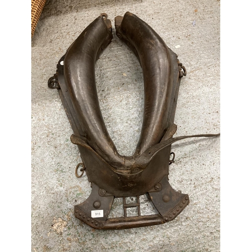 915 - A LARGE LEATHER HORSE COLLAR