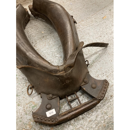 915 - A LARGE LEATHER HORSE COLLAR