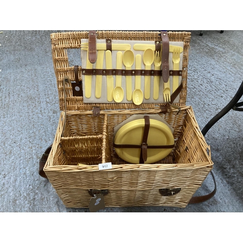 917 - AN ANTLER WICKER PICNIC BASKET WITH ACCESSORIES