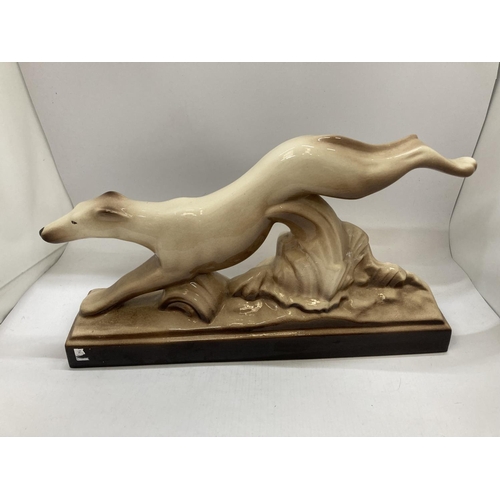 944 - A LARGE CERAMIC GREYHOUND LENGTH 43CM