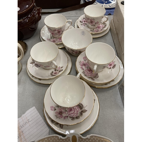 947 - A QUEEN ANNE VINTAGE TEASET TO INCLUDE CUPS, SAUCERS, SIDE PLATES AND SUGAR BOWL PLUS A FLORA DECORA... 