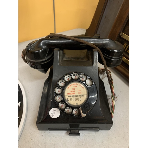 95 - A VINTAGE BLACK BAKELITE TELEPHONE