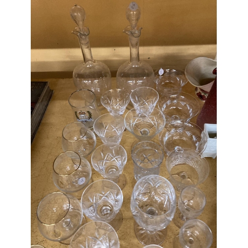 955 - A LARGE QUANTITY OF GLASSWARE TO INCLUDE CUT GLASS - ETCHED DECANTERS, DESSERT BOWLS, LICQUER GLASSE... 