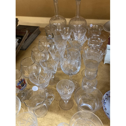 955 - A LARGE QUANTITY OF GLASSWARE TO INCLUDE CUT GLASS - ETCHED DECANTERS, DESSERT BOWLS, LICQUER GLASSE... 