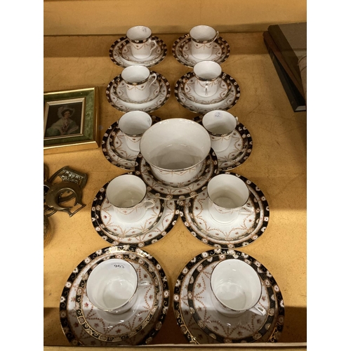 963 - AN EDWARDIAN BONE CHINA PART TEA SERVICE TO INCLUDE CUPS, SAUCERS, SIDE PLATES, A SUGAR BOWL, ETC