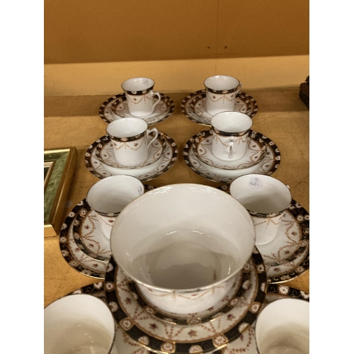 963 - AN EDWARDIAN BONE CHINA PART TEA SERVICE TO INCLUDE CUPS, SAUCERS, SIDE PLATES, A SUGAR BOWL, ETC