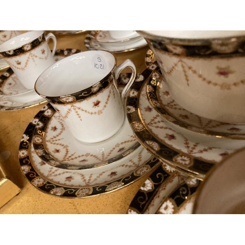 963 - AN EDWARDIAN BONE CHINA PART TEA SERVICE TO INCLUDE CUPS, SAUCERS, SIDE PLATES, A SUGAR BOWL, ETC