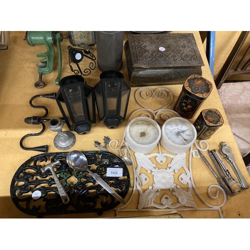 966 - A LARGE QUANTITY OF METAL WARE ITEMS TO INCLUDE VINTAGE TINS, MINCERS, NUTCRACKERS, FLATWARE, A LIGH... 