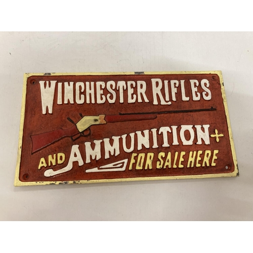 980 - A CAST WINCHESTER RIFLES SIGN 31CM X 17CM