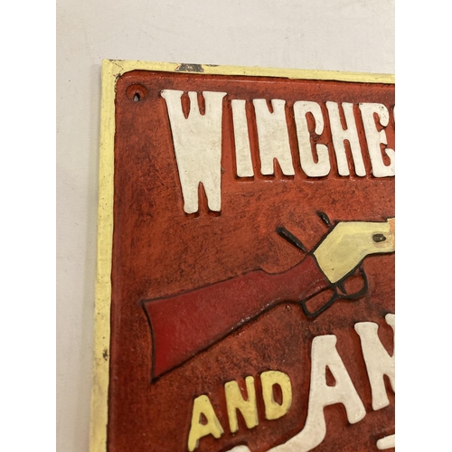 980 - A CAST WINCHESTER RIFLES SIGN 31CM X 17CM