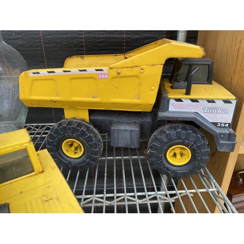 1734 - TWO VINTAGE TONKA TRUNK DUMP TRUCKS