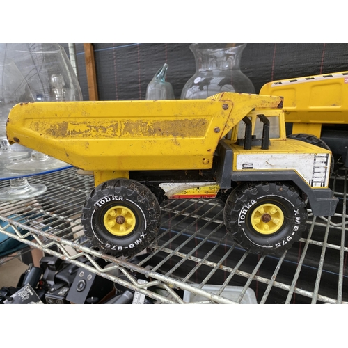 1734 - TWO VINTAGE TONKA TRUNK DUMP TRUCKS