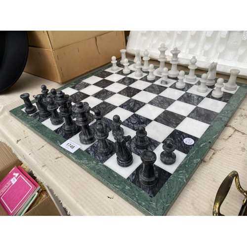 1746 - A COMPLETE MARBLE EFFECT CHESS SET AND BOARD