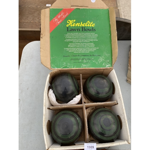 1909 - A SET OF HENSELITE LAWN BOWLS AND A PAIR OF VINTAGE CROWN GREEN BOWLS WOODS