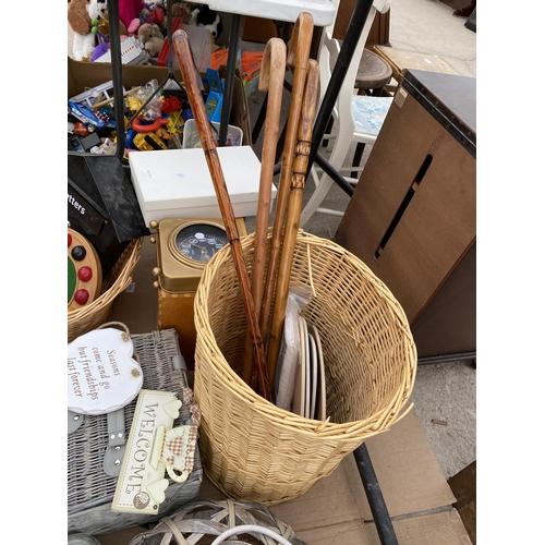 1919 - AN ASSORTMENT OF ITEMS TO INCLUDE WICKER BASKETS, WALKING STICKS AND A LETTER BOX ETC