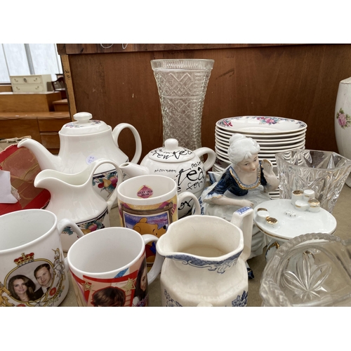 1949 - AN ASSORTMENT OF CERAMIC ITEMS TO INCLUDE CUPS, TEAPOTS AND JUGS ETC