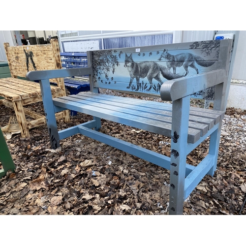 2012 - A WOODEN SLATTED GARDEN BENCH WITH FOX DETAIL