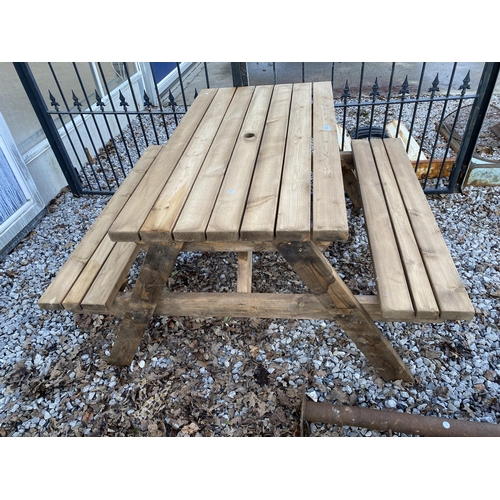 2027 - A WOODEN PICNIC BENCH AND TABLE