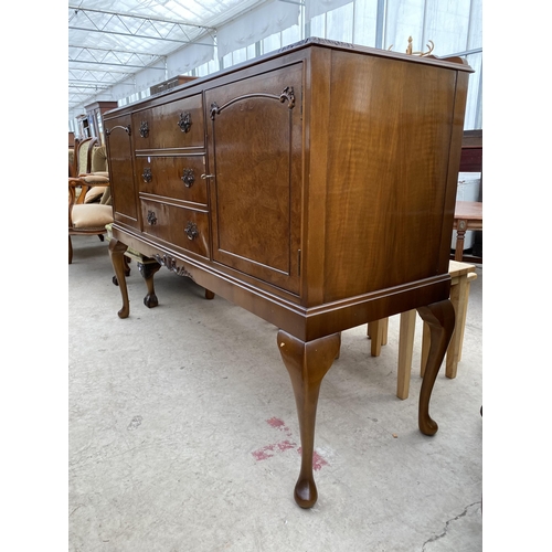 2791 - A MID 20TH CENTURY WALNUT SIDEBOARD WITH RAISED BACK ON CABRIOLE LEGS, ENCLOSING THREE DRAWERS AND T... 