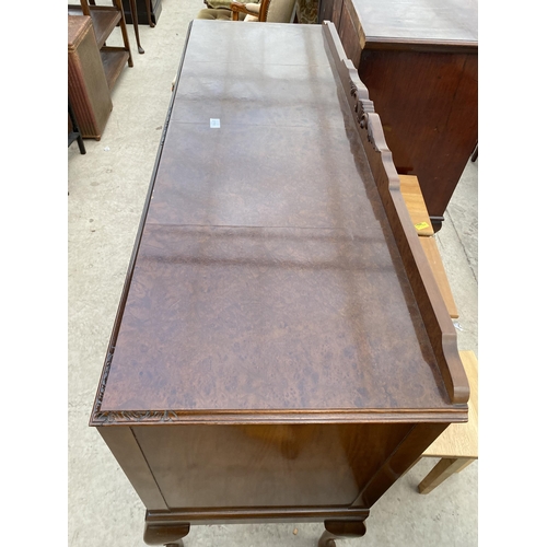 2791 - A MID 20TH CENTURY WALNUT SIDEBOARD WITH RAISED BACK ON CABRIOLE LEGS, ENCLOSING THREE DRAWERS AND T... 