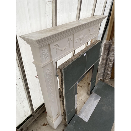 2800 - AN ADAM STYLE FIRE SURROUND WITH TILED CENTRE SECTION AND HEARTH