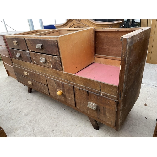 2804 - A MID 20TH CENTURY SHOP COUNTER CARCASS WITH EIGHT DRAWERS, 64