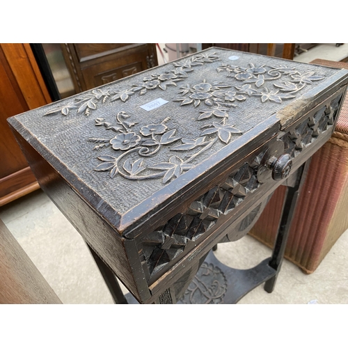 2807 - A VICTORIAN EBONISED OAK SIDE TABLE, THE TOP PROFUSELY CARVED WITH FLOWERS COMPLETE WITH SINGLE DRAW... 