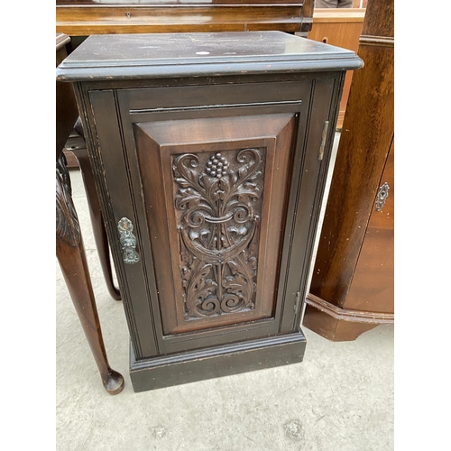 2809 - A VICTORIAN POT CUPBOARD WITH PROFUSELY CARVED DOOR AND A SERPENTINE FRONT TWO DRAWER SIDE-TABLE ON ... 