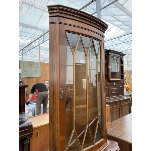 2810 - A MAHOGANY CORNER CUPBOARD WITH GLAZED UPPER PORTION