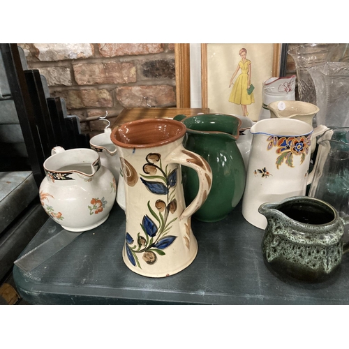 1116 - A VERY LARGE MIXED LOT TO INCLUDE CERAMIC JUGS, ROYAL DOULTON SPANIELS, PLATES, VASE, FIGURES, ETC P... 