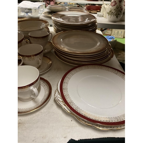 1121 - A RED, WHITE AND GOLD FILIGREE DINNER SERVICE OF THE SAME PATTERN BY DUCHESS, GRAFTON AND SALISBURY ... 