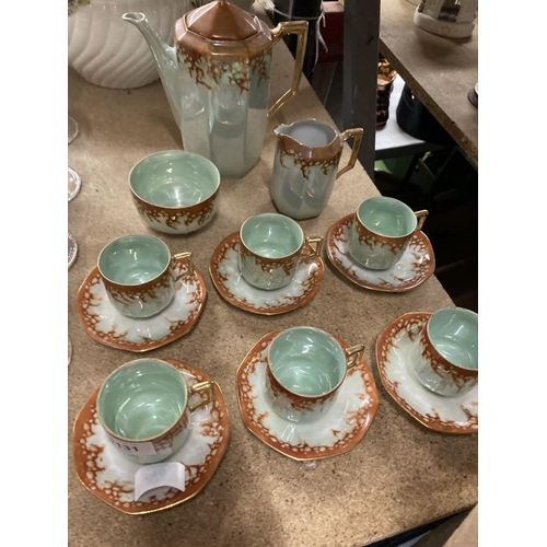 1131 - A VINTAGE CHINA COFFEE SET IN A GREEN LUSTRE WITH COPPER COLOURED DECORATION TO INCLUDE A COFFEE POT... 