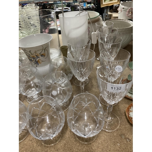 1132 - A LARGE QUANTITY OF GLASSWARE TO INCLUDE VASES, A TABLE LAMP, TABLE LIGHTER, BRANDY GLASSES, WINE, T... 