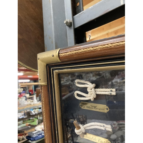 1138 - A FRAMED QUANTITY OF SAILING KNOTS