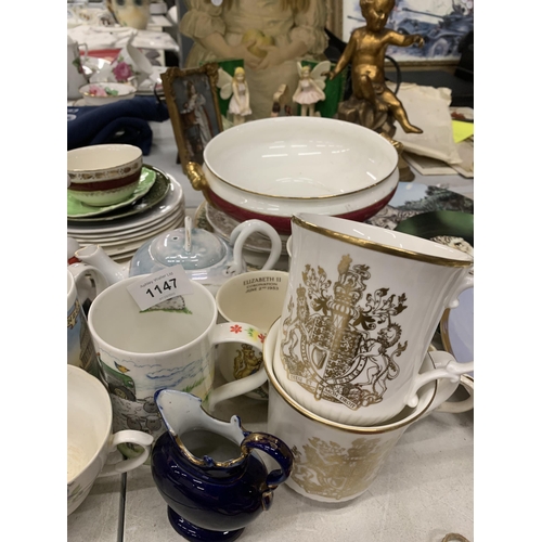 1147 - A QUANTITY OF CERAMIC ITEMS TO INCLUDE MUGS, PLATES, A SERVING BOWL, CHEF CRUET SET