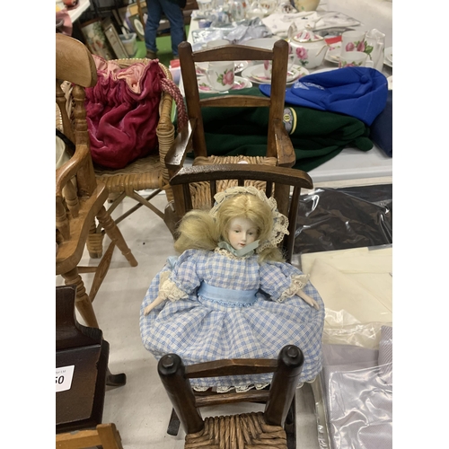 1150 - A QUANTITY OF DOLL'S CHAIRS PLUS TWO DOLLS WITH CERAMIC HEADS