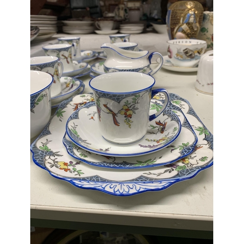 1161 - A PHOENIX CHINA TEASET TO INCLUDE SIX TRIOS, A SUGAR BOWL, MI;K JUG AND CAKE PLATE