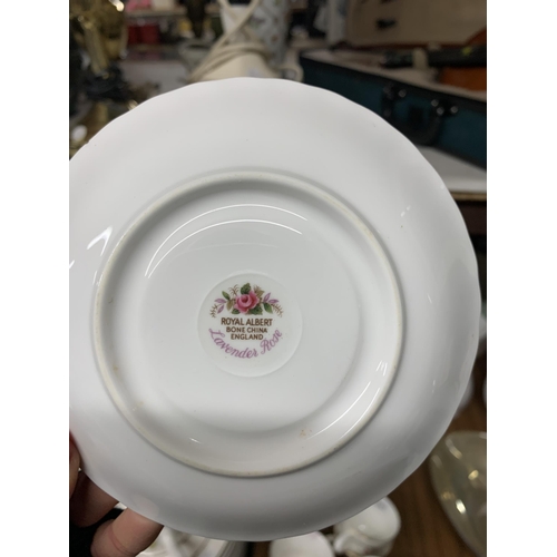 1203 - A QUANTITY OF ROYAL ALBERT 'LAVENDER ROSE' TEAWARE TO INCLUDE CUPS, SAUCERS AND SIDE PLATES