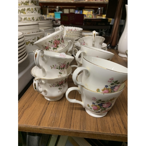 1203 - A QUANTITY OF ROYAL ALBERT 'LAVENDER ROSE' TEAWARE TO INCLUDE CUPS, SAUCERS AND SIDE PLATES