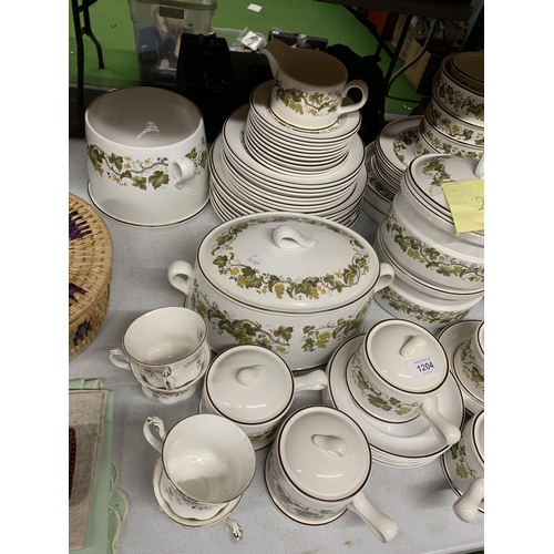 1204 - A LARGE QUANTITY OF WEDGWOOD 'VINE' PATTERN DINNER WARE TO INCLUDE VARIOUS SIZED PLATES, SERVING DIS... 