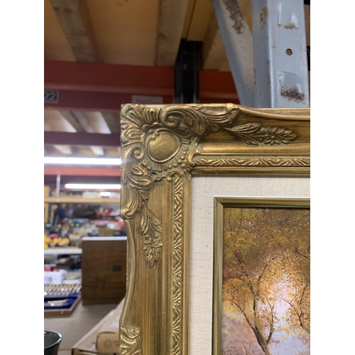 1230 - TWO OIL ON CANVAS PAINTINGS OF LAKE SCENES IN GILT FRAMES