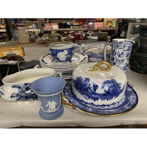 1233 - A LARGE QUANTITY OF BLUE AND WHITE POTTERY TO INCLUDE A LARGE PLATTER, PLATES, A BURLEIGHWARE JUG, D... 