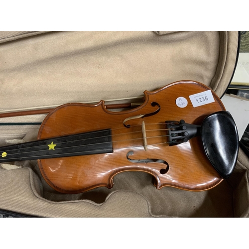 1236 - A VIOLIN AND BOW IN A FITTED CASE