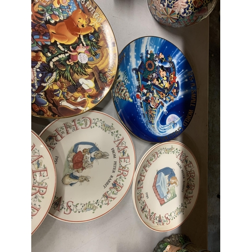 856 - TEN CABINET PLATES TO INCLUDE TWO DISNEY PLATES AND PETER RABBIT CHRISTMAS EDITIONS