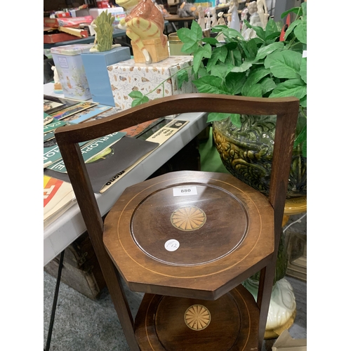 880 - AN INLAID MAHOGANY THREE TIER FOLDING CAKE STAND