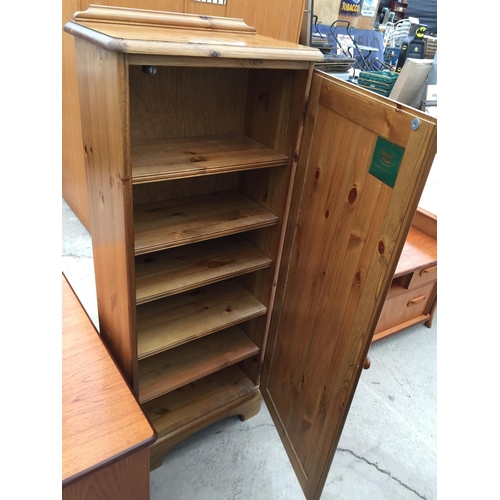 2828 - A MODERN PINE DUCAL STORAGE CUPBOARD WITH SIX INTERNAL SHELVES, 18.5