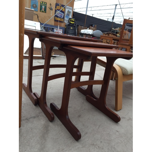 2833 - A RETRO TEAK NEST OF THREE TABLES