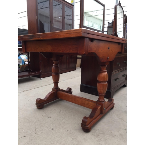 2839A - AN EARLY 20TH CENTURY OAK FOLD-OVER PASTRY TABLE